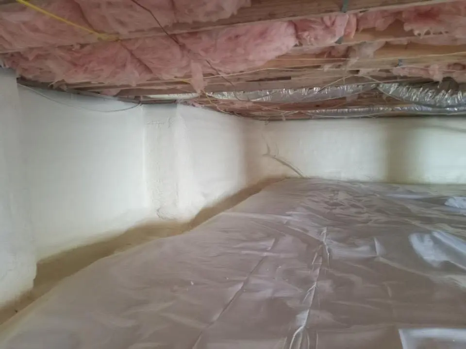 Crawl space encapsulation with closed-cell spray foam for Commercial Roof Restoration in Leominster